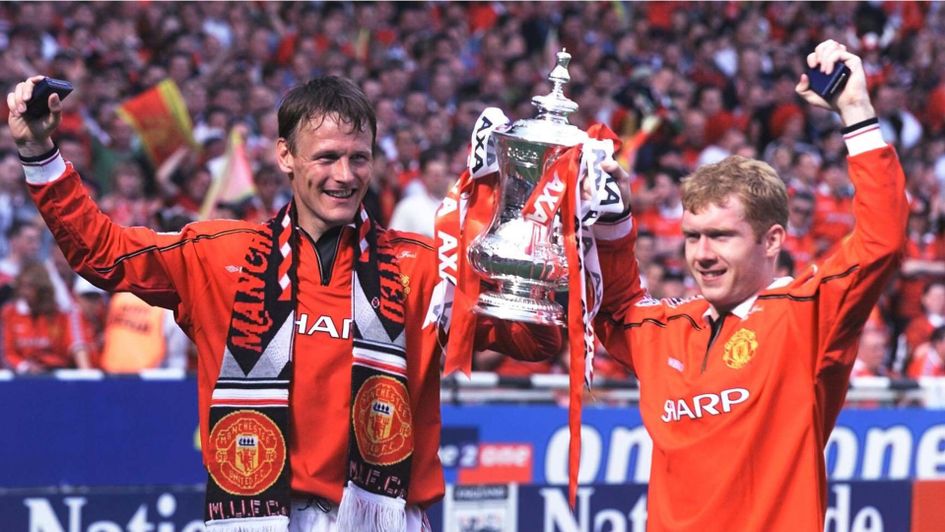 Teddy Sheringham and Paul Scholes lift the FA Cup