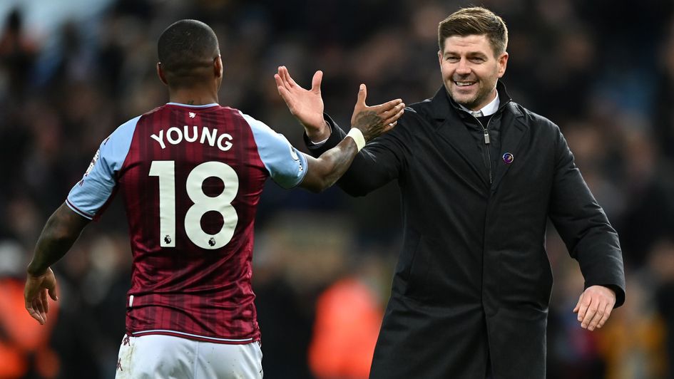 Steven Gerrard celebrates with Ashley Young