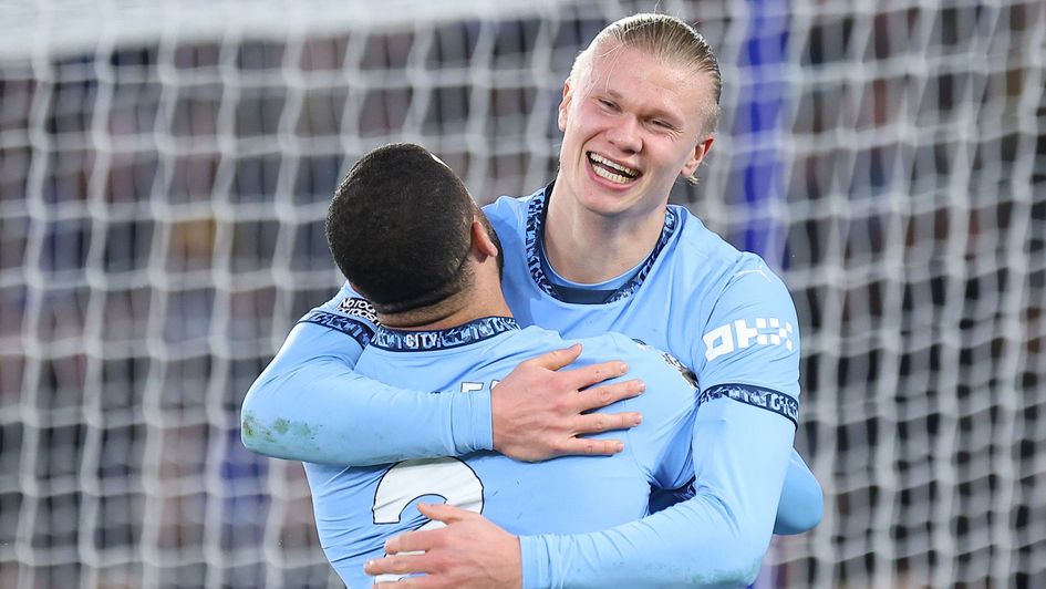 Erling Haaland of Manchester City celebrates scoring their sides second goal with team-mate Kyle Walker of Manchester City