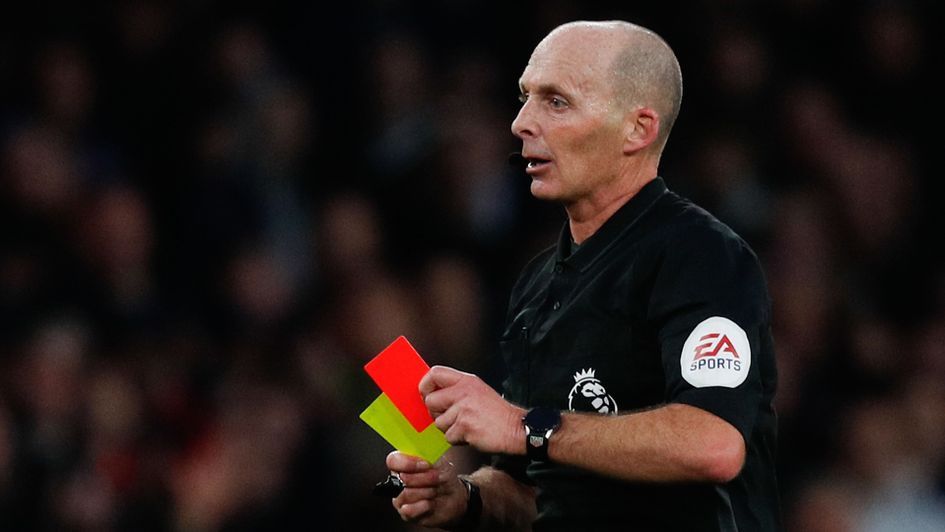 Mike Dean isn't afraid to show a card