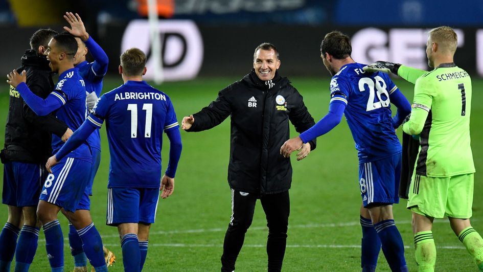 Leicester manager Brendan Rodgers and players celebrate their victory at Leeds