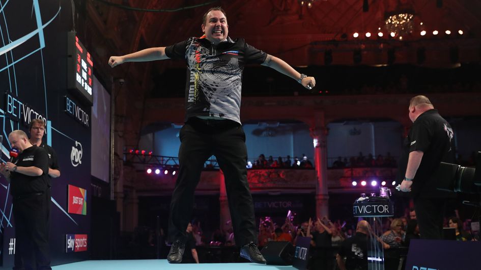 Kim Huybrechts jumps for joy (Picture: PDC/Lawrence Lustig)