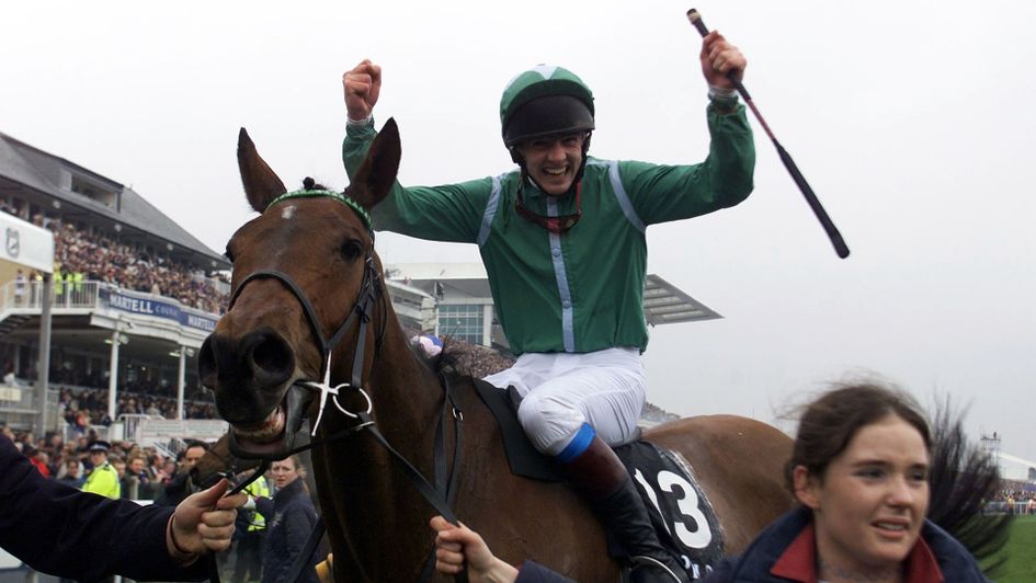 Ruby Walsh celebrates after winning the 2000 Grand National