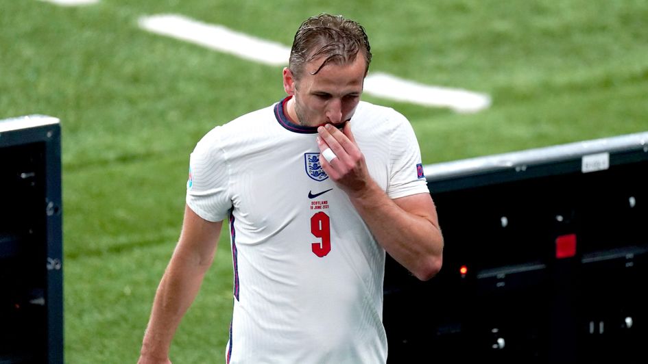 A despondent-looking Harry Kane leaves the field