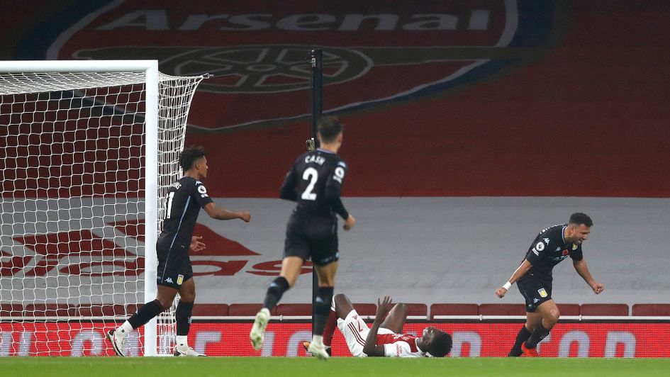 Aston Villa celebrate after Bukayo Saka's own goal