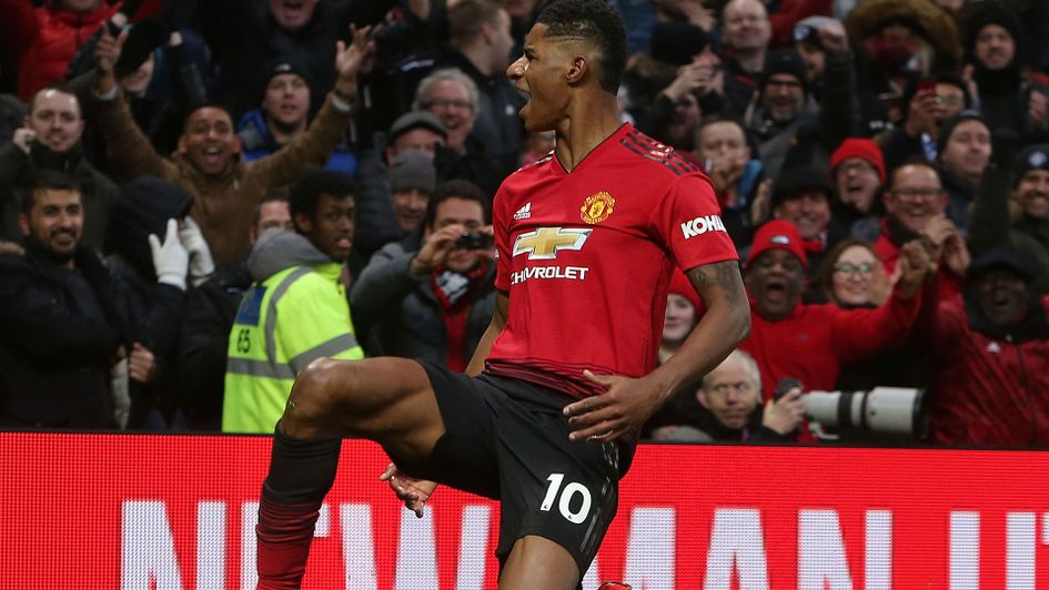 Marcus Rashford celebrates his goal on his 150th appearance for Manchester United