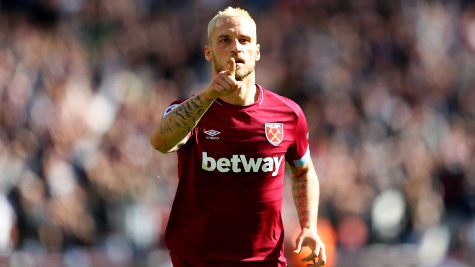 Marko Arnautovic celebrates after scoring the third goal