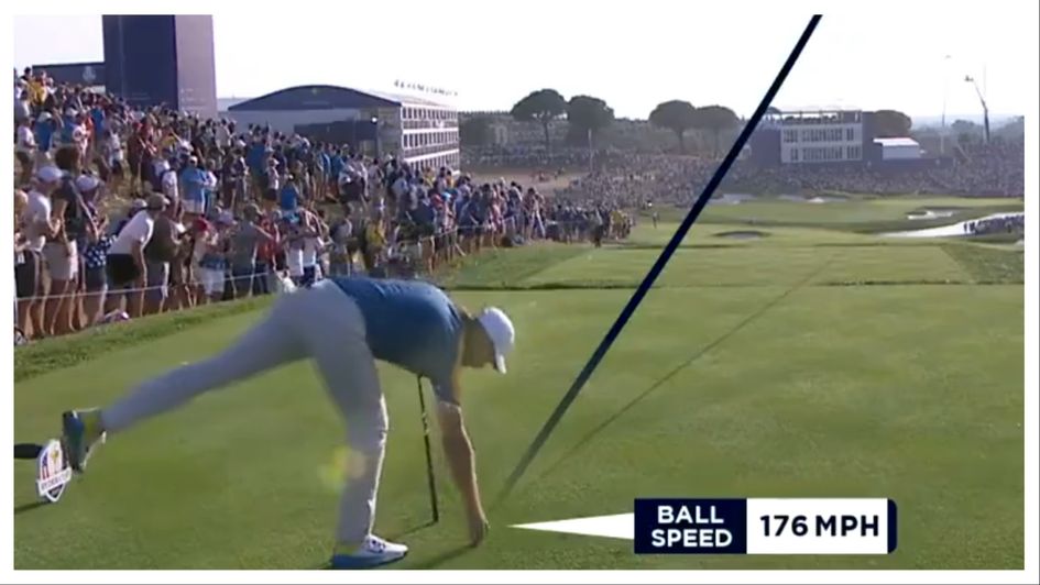 Tommy Fleetwood reaches down for the tee