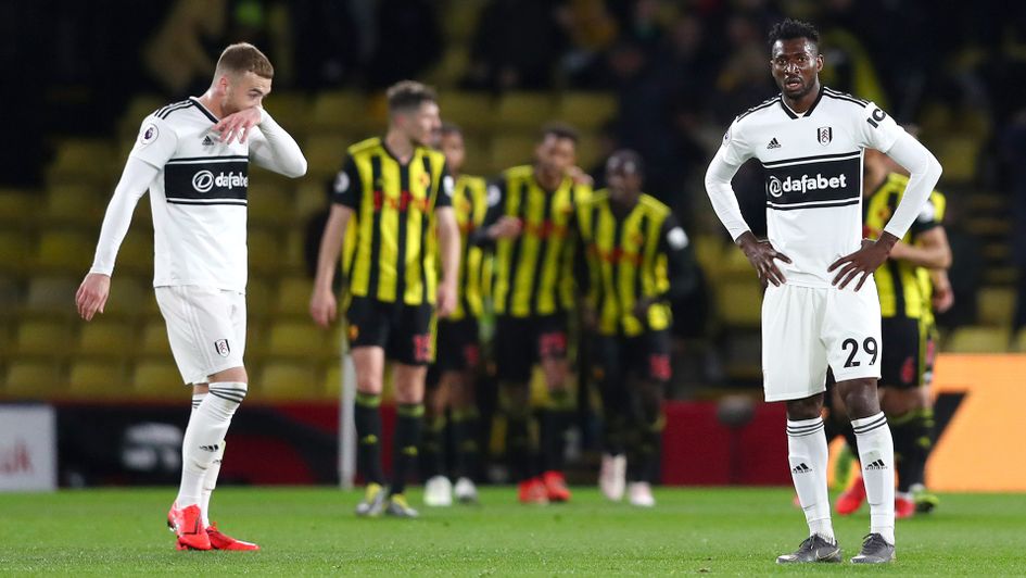 Fulham's Calum Chambers and Andre-Frank Zambo Anguissa look dejected after Watford score