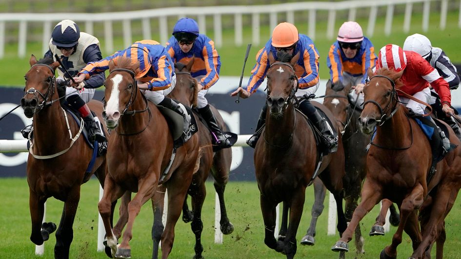 Love (second left, white face) wins the Moyglare Stud Stakes