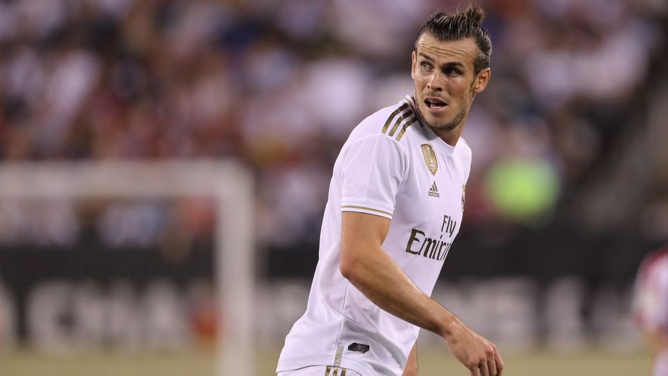 Gareth Bale: Final outing for Real Madrid? Welsh forward in action against Atletico Madrid in pre-season