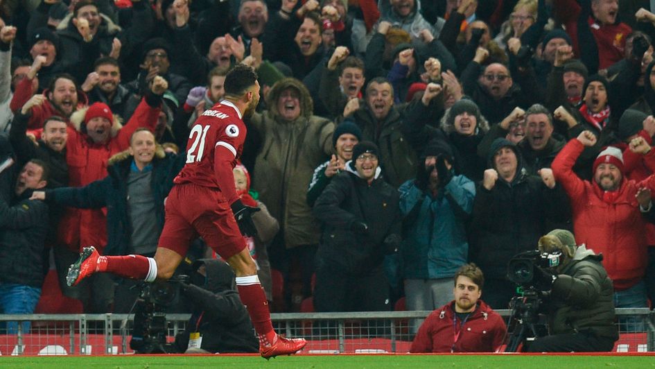 Alex Oxlade-Chamberlain and the Liverpool fans celebrate