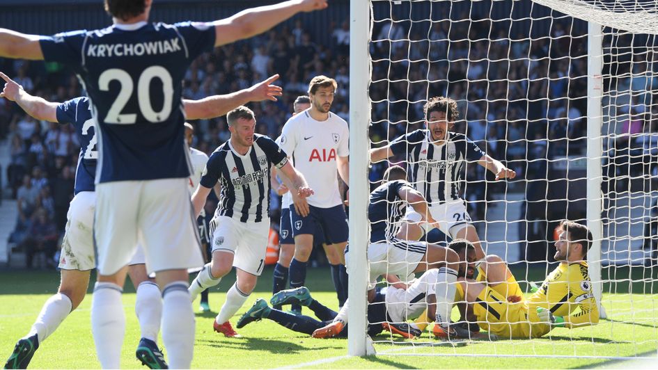 West Brom's Jake Livermore bundles the ball in against Tottenham