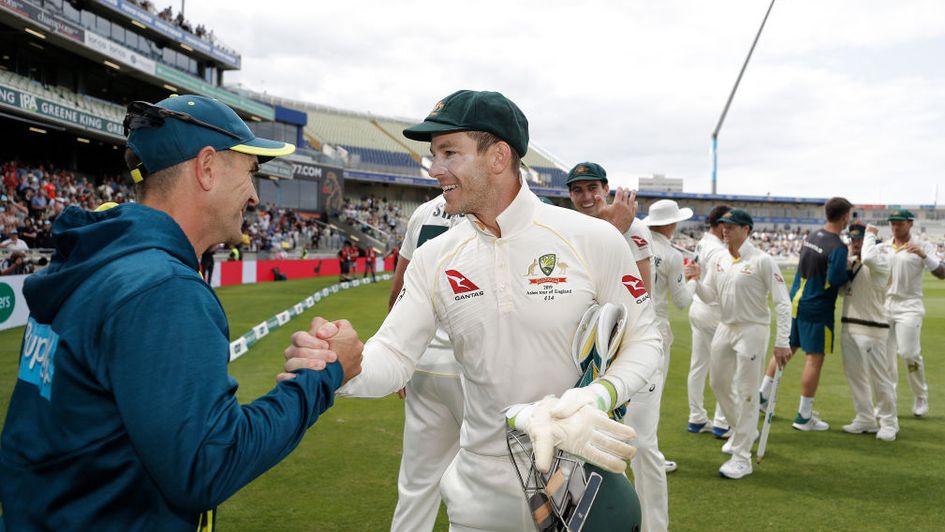 Tim Paine and Justin Langer celebrate