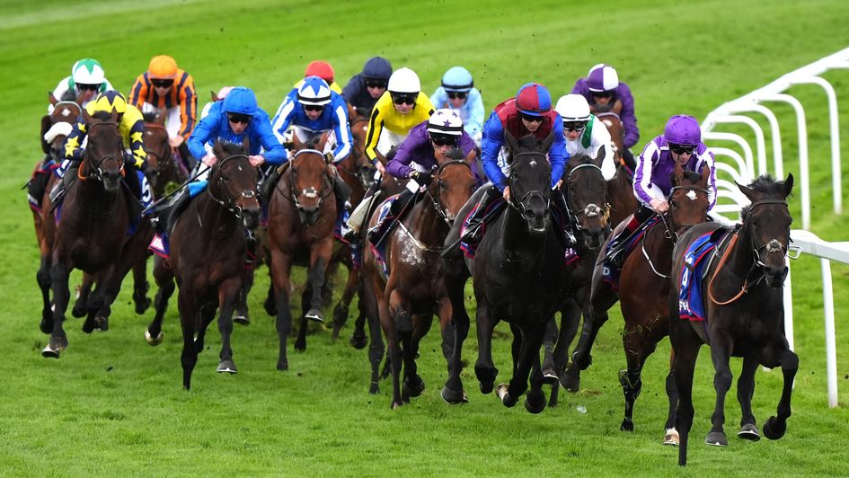 The Derby field go for home at Epsom