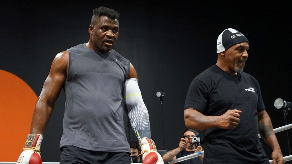 Francis Ngannou with Mike Tyson