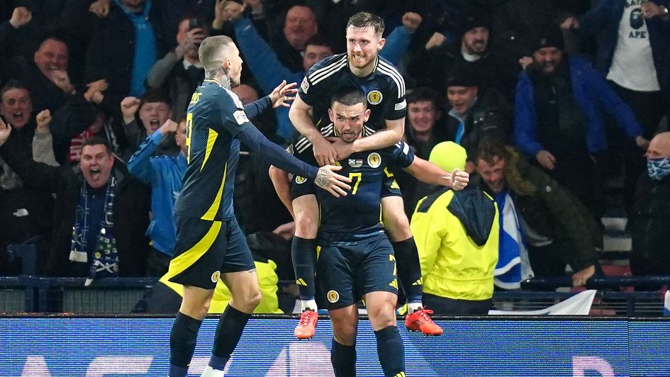 Scotland celebrate John McGinn's late winner against Croatia