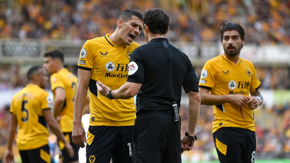 Wolves' Conor Coady remonstrates with Darren England