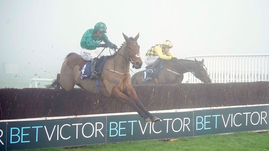 Night And Day leaps through the fog in the first race