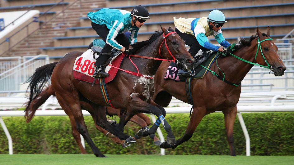 Romantic Warrior (black cap) strides out at Sha Tin