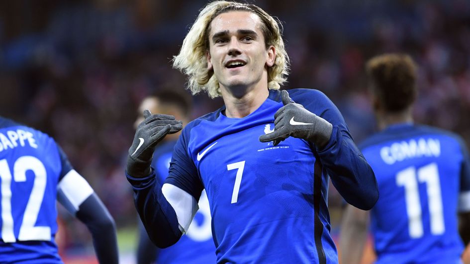 Antoine Griezmann celebrates the opening goal