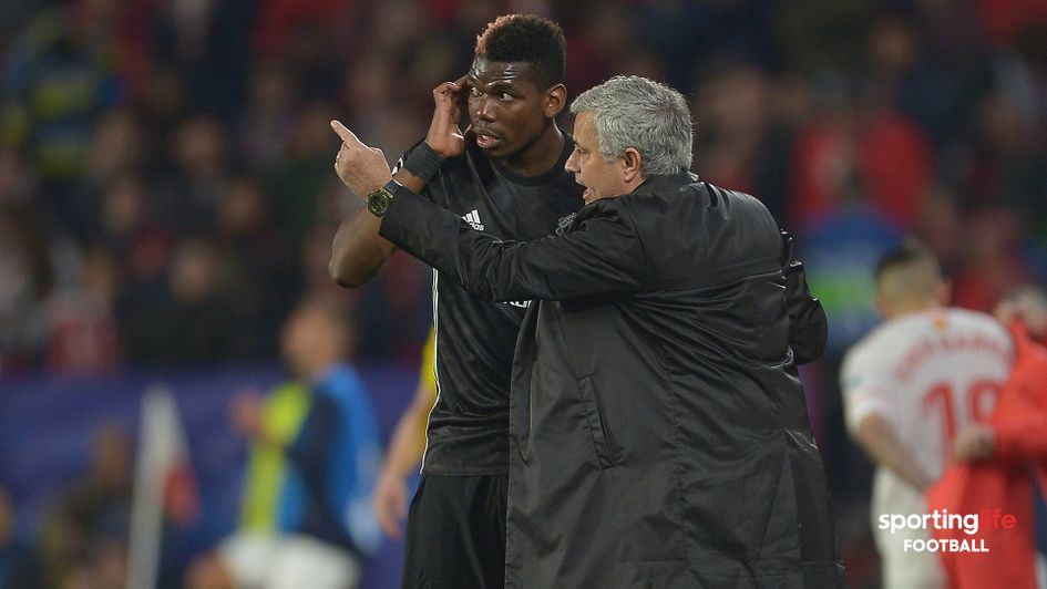 Jose Mourinho in discussion with Paul Pogba during the Champions League game against Sevilla