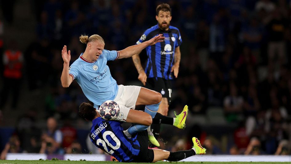 Hakan Çalhanoğlu tackles Erling Haaland