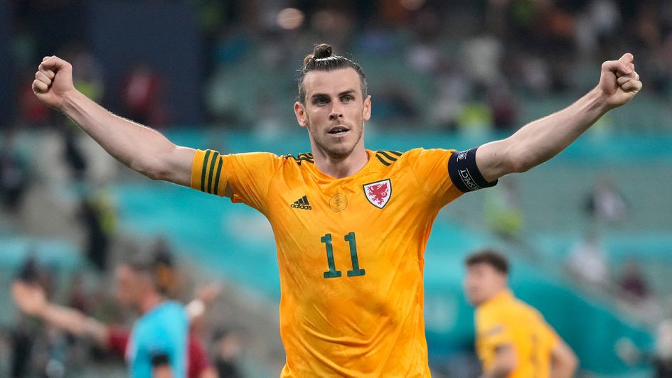 Gareth Bale celebrates during victory over Turkey