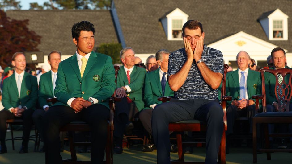 Scottie Scheffler can't hide his emotions as he prepares to receive a Green Jacket