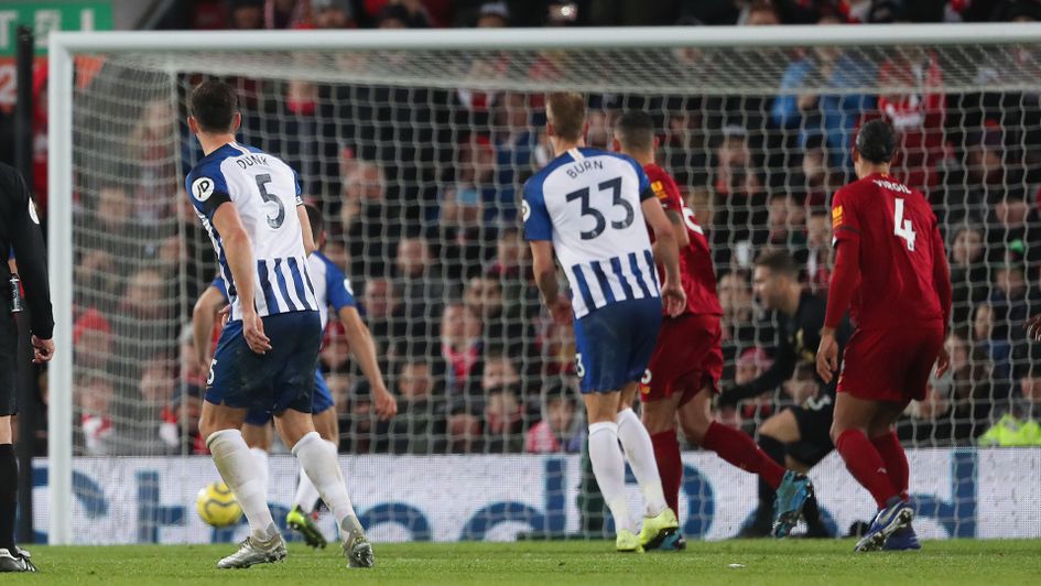 Lewis Dunk scores his free-kick against Liverpool