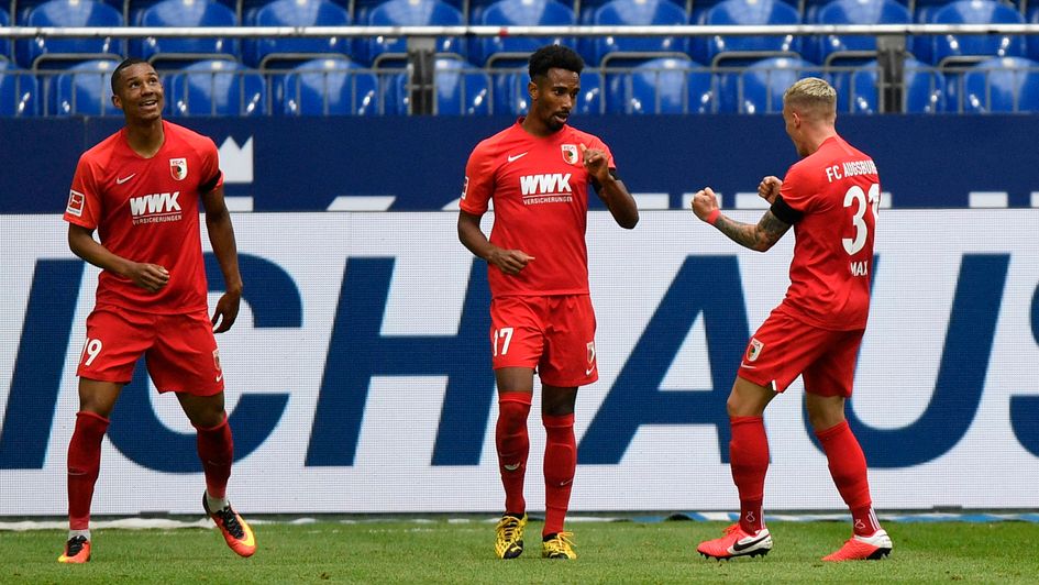 Augsburg celebrate Noah Sarenren Bazee's goal in the 3-0 win at Schalke