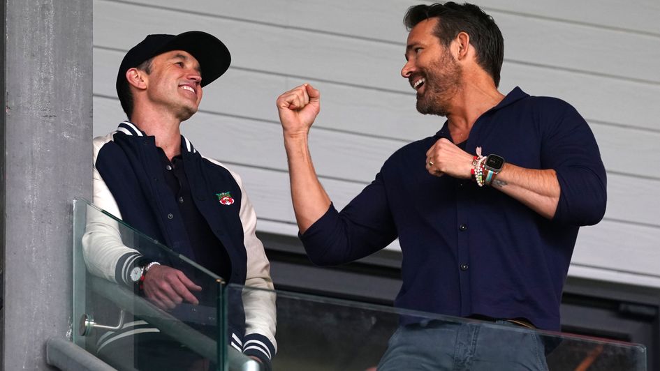 Wrexham co-owners Rob McElhenney (left) and Ryan Reynolds celebrate