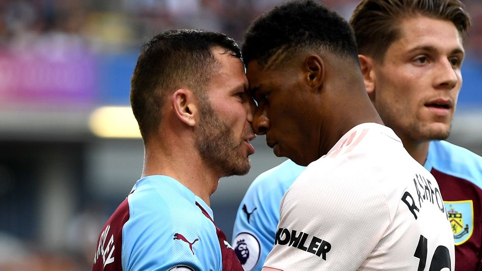 Marcus Rashford: The Manchester United forward (right) sees red against Burnley