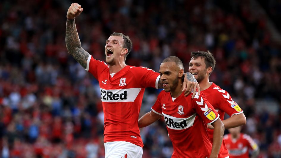 Aden Flint (left) celebrates after scoring against Sheffield United