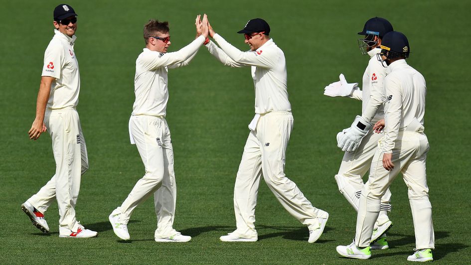 Mason Crane and England celebrate