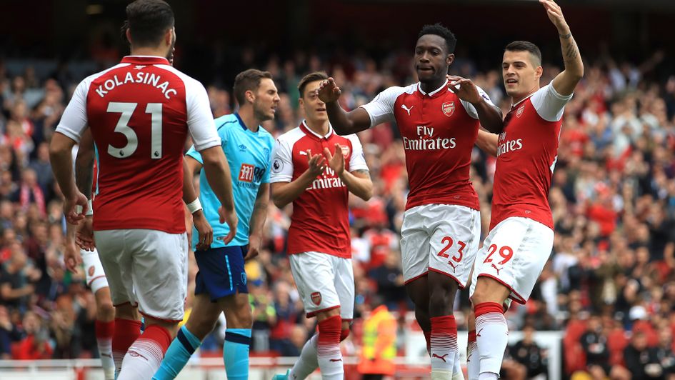 Danny Welbeck celebrates with Arsenal team mates