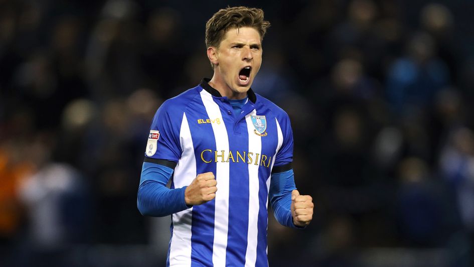 Adam Reach celebrates after scoring against Leeds