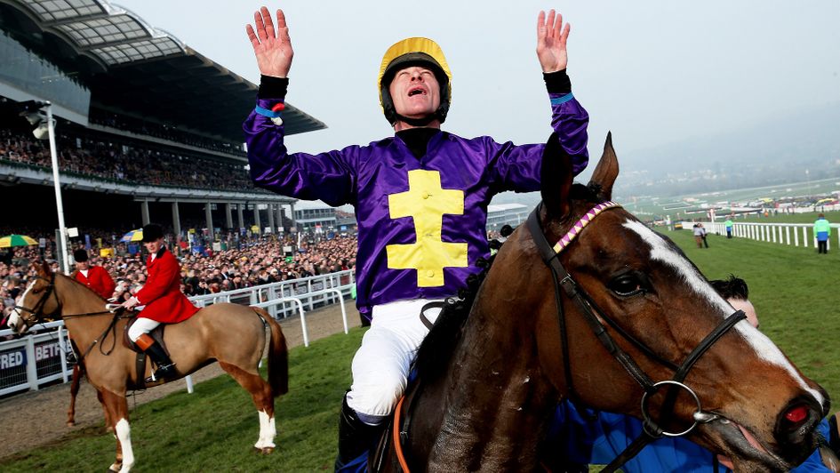 Davy Russell celebrates after winning the Gold Cup on Lord Windermere