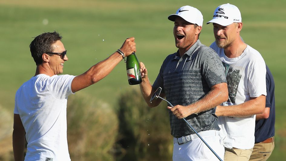 Olesen celebrates with Bjerregaard