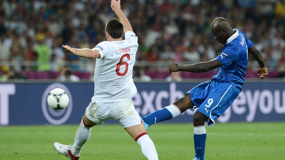 John Terry looks to stop Mario Balotelli