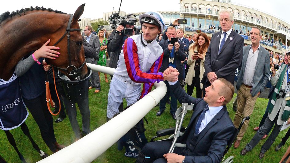 Daniel Tudhope is congratulated by a sidelined PJ McDonald after Laurens bags another Group One